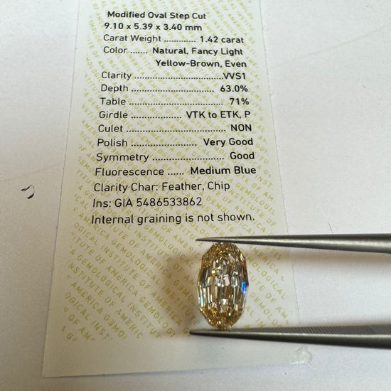 ANTICIPO / APARTADO Diamante Fancy Light Yellow Brown 1.42ct en corte Oval escalonado, valor total 87,600 pesos