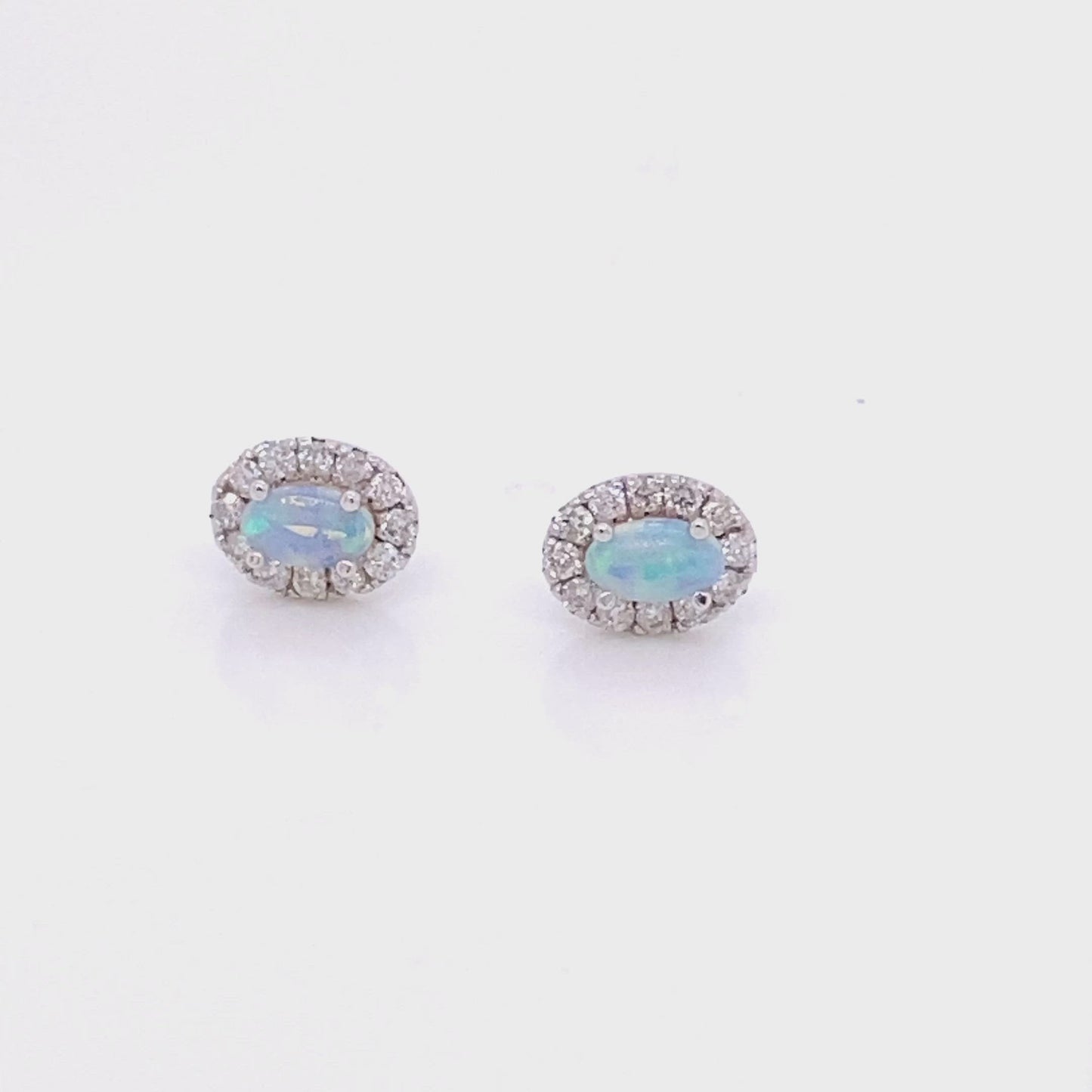 Load and play video in Gallery viewer, Oval Opal Earrings with Diamond Halo
