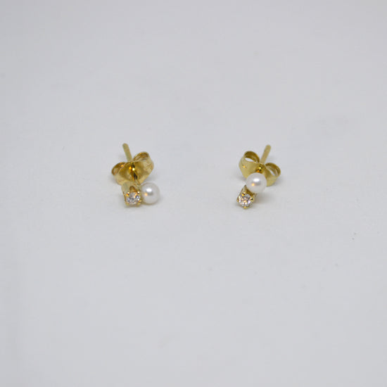 Pearl and diamond earrings