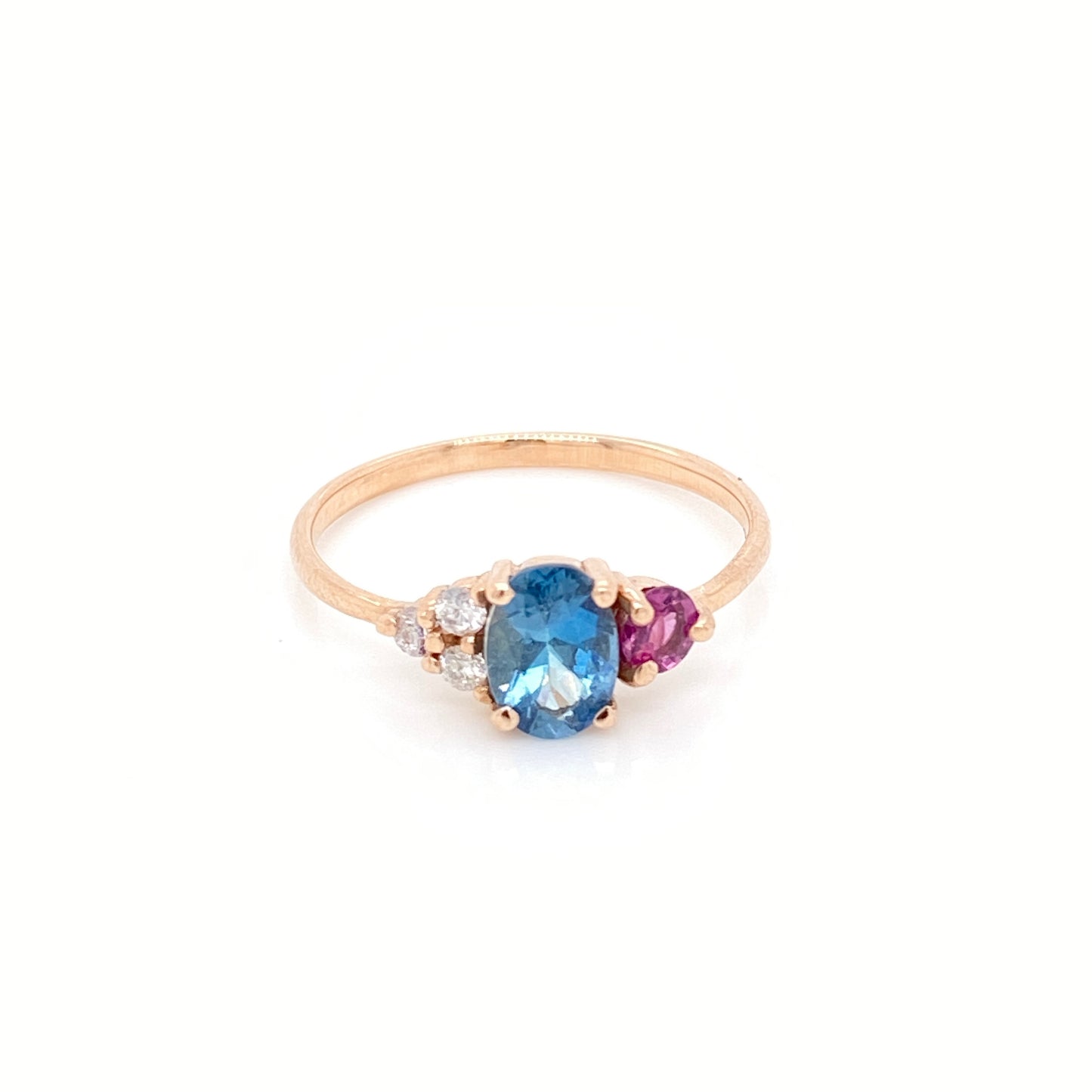 Intense blue Aquamarine ring with Rhodolite and Diamonds