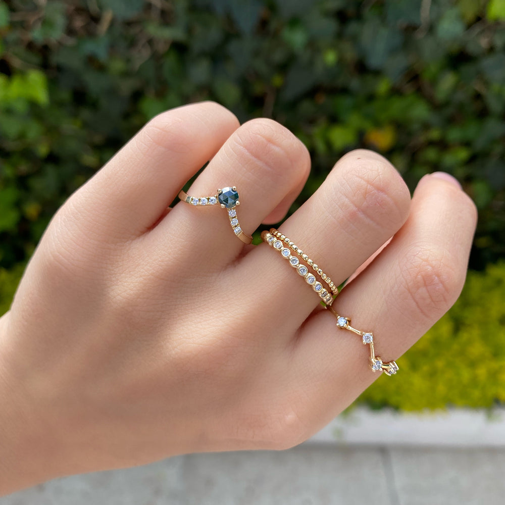 
                      
                        Anillo de Diamante salt and pepper azul con diamantes blancos
                      
                    