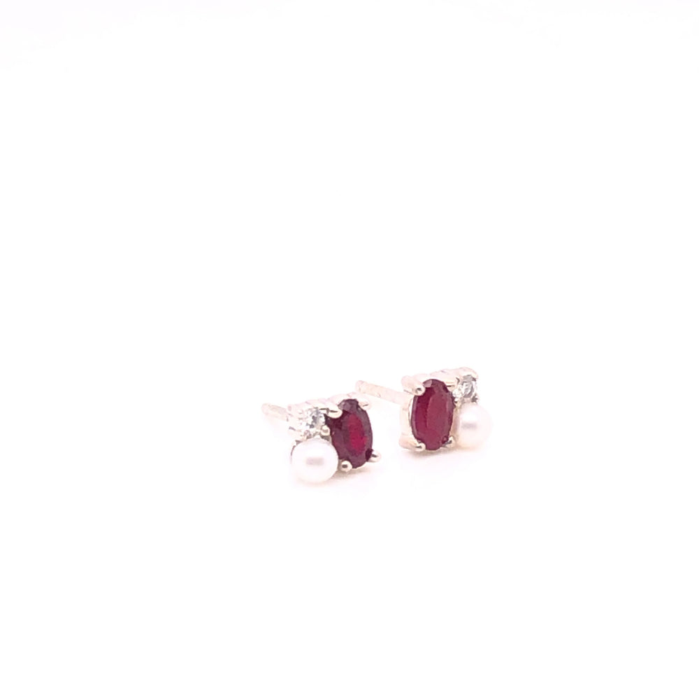 
                      
                        Erika Earrings with Sapphire or Ruby
                      
                    