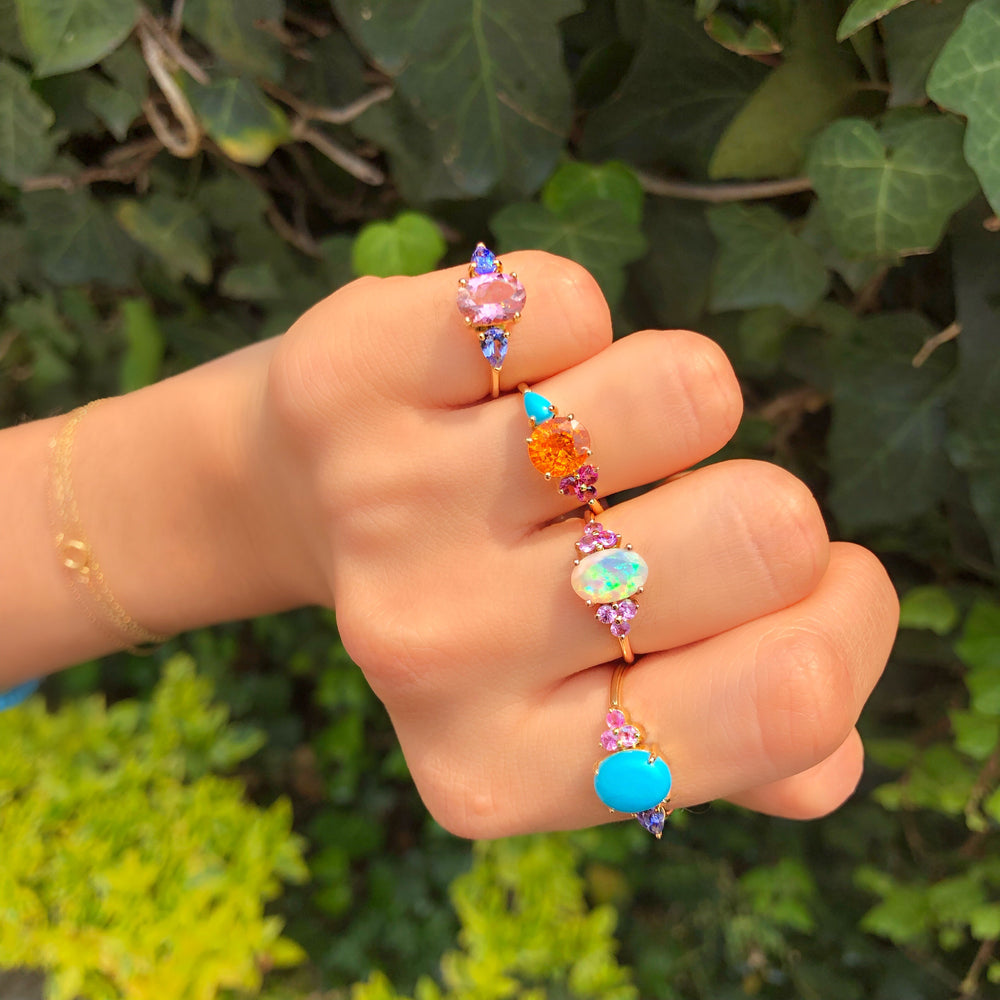 
                      
                        Anillo de Turquesa con Tanzanita y Zafiro Rosa
                      
                    