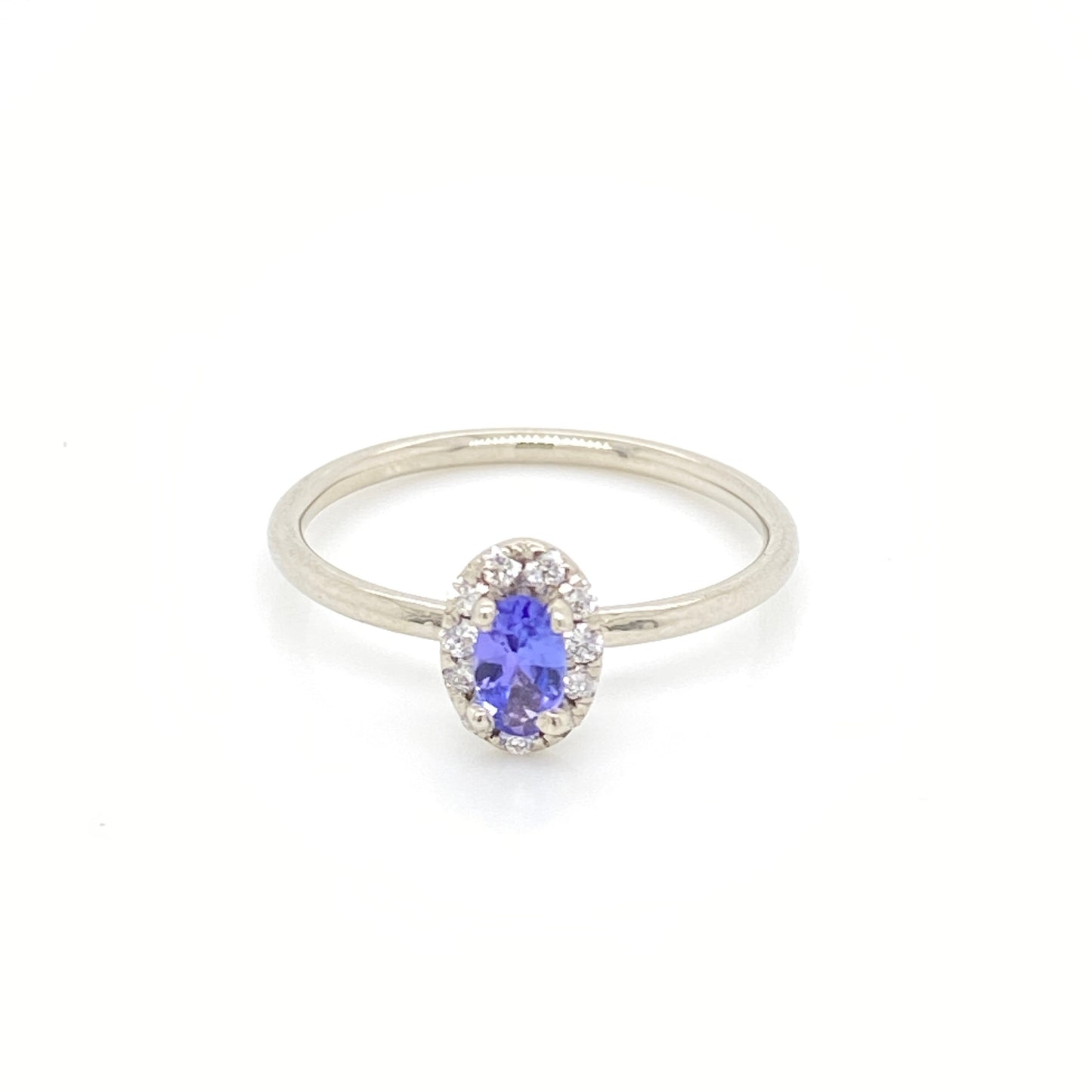 Load image into Gallery viewer, Tanzanite Ring with Diamond Halo

