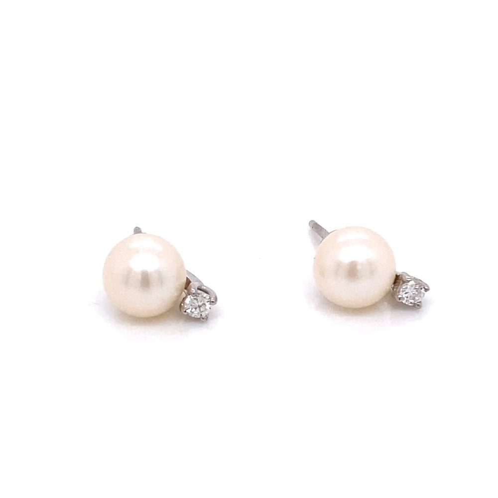 
                      
                        Regina Pearl and Diamond Earrings
                      
                    