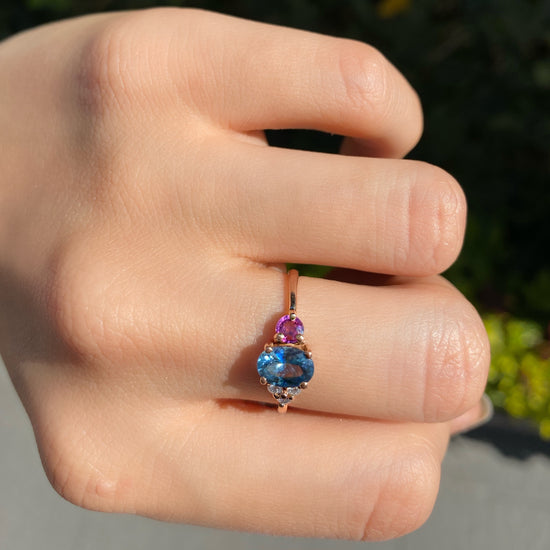 Intense blue Aquamarine ring with Rhodolite and Diamonds