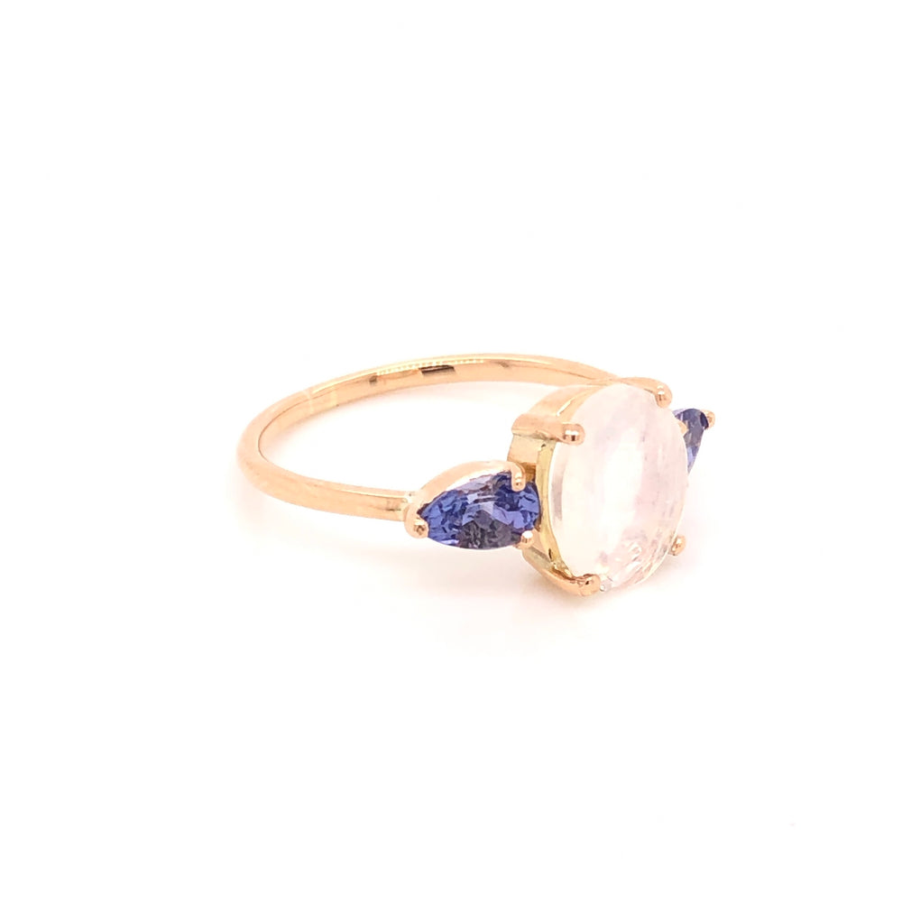 
                      
                        Anillo de Moonstone con Tanzanitas
                      
                    