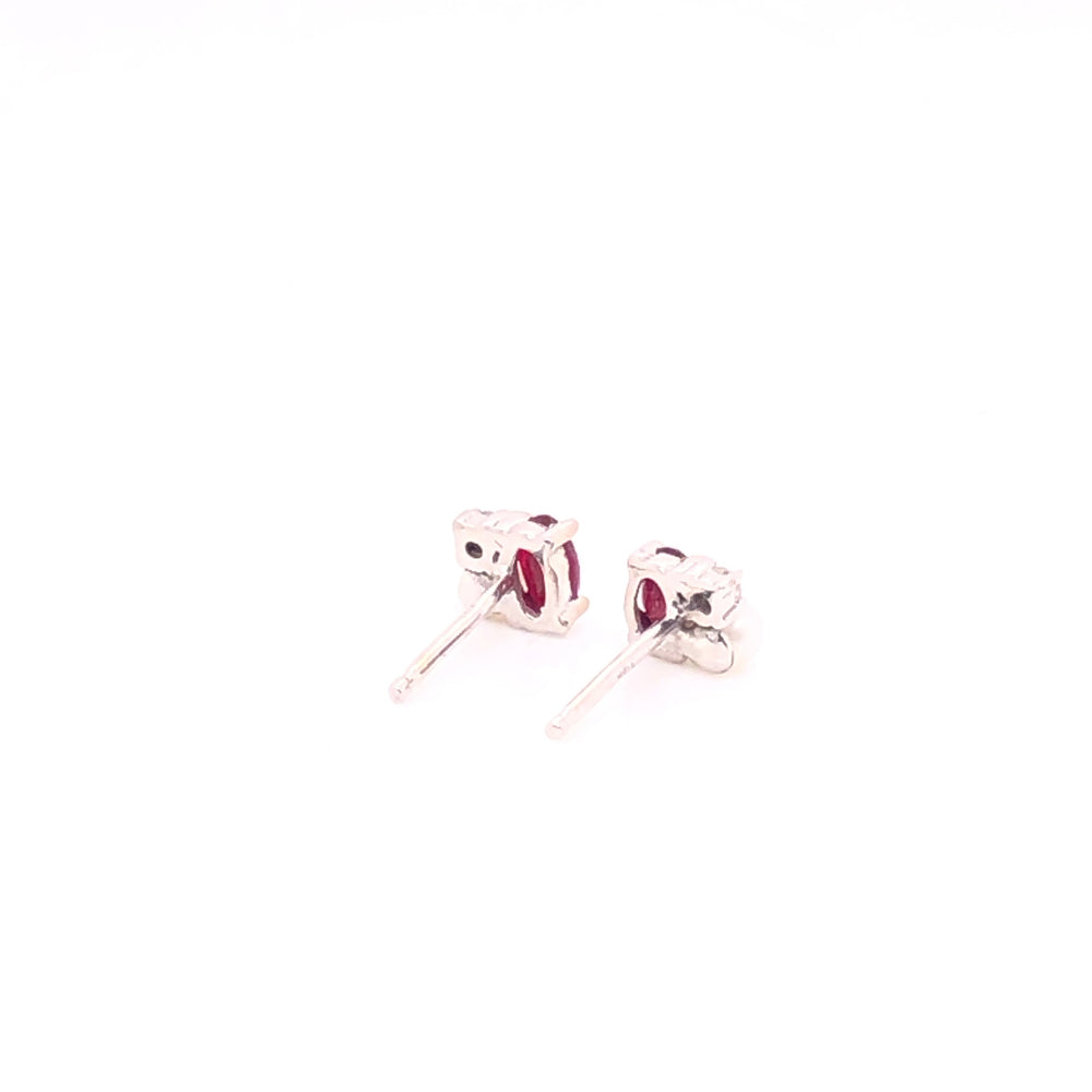 
                      
                        Erika Earrings with Sapphire or Ruby
                      
                    