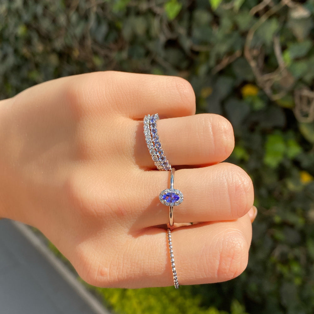 
                      
                        Anillo de Tanzanita con Halo de Diamantes
                      
                    