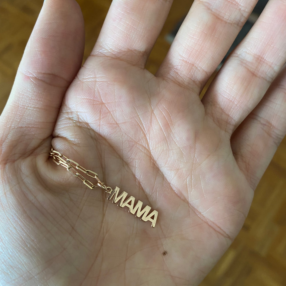 
                      
                        “MOM” Charm Solid Gold
                      
                    