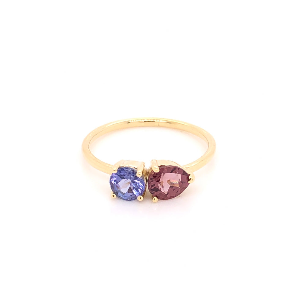 
                      
                        Anillo De Granate con Tanzanita
                      
                    