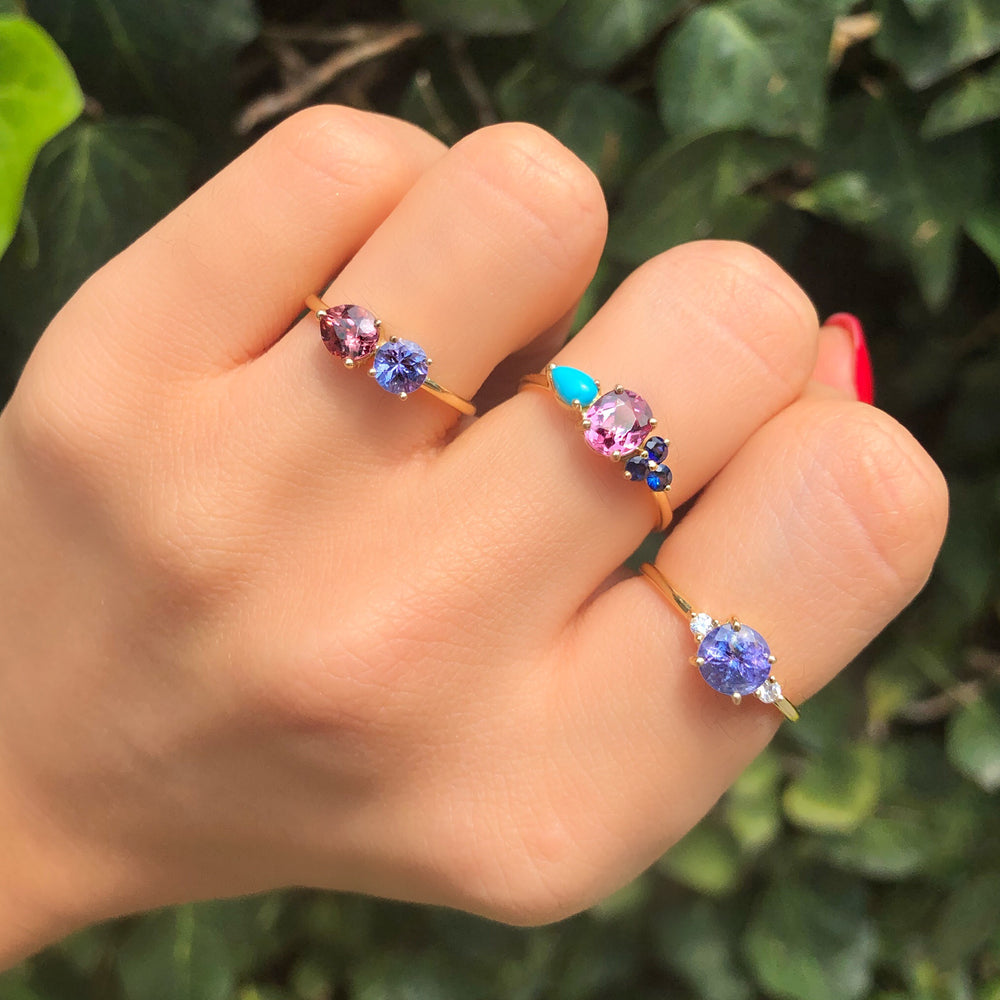 
                      
                        Garnet Ring with Turquoise and Blue Sapphire
                      
                    