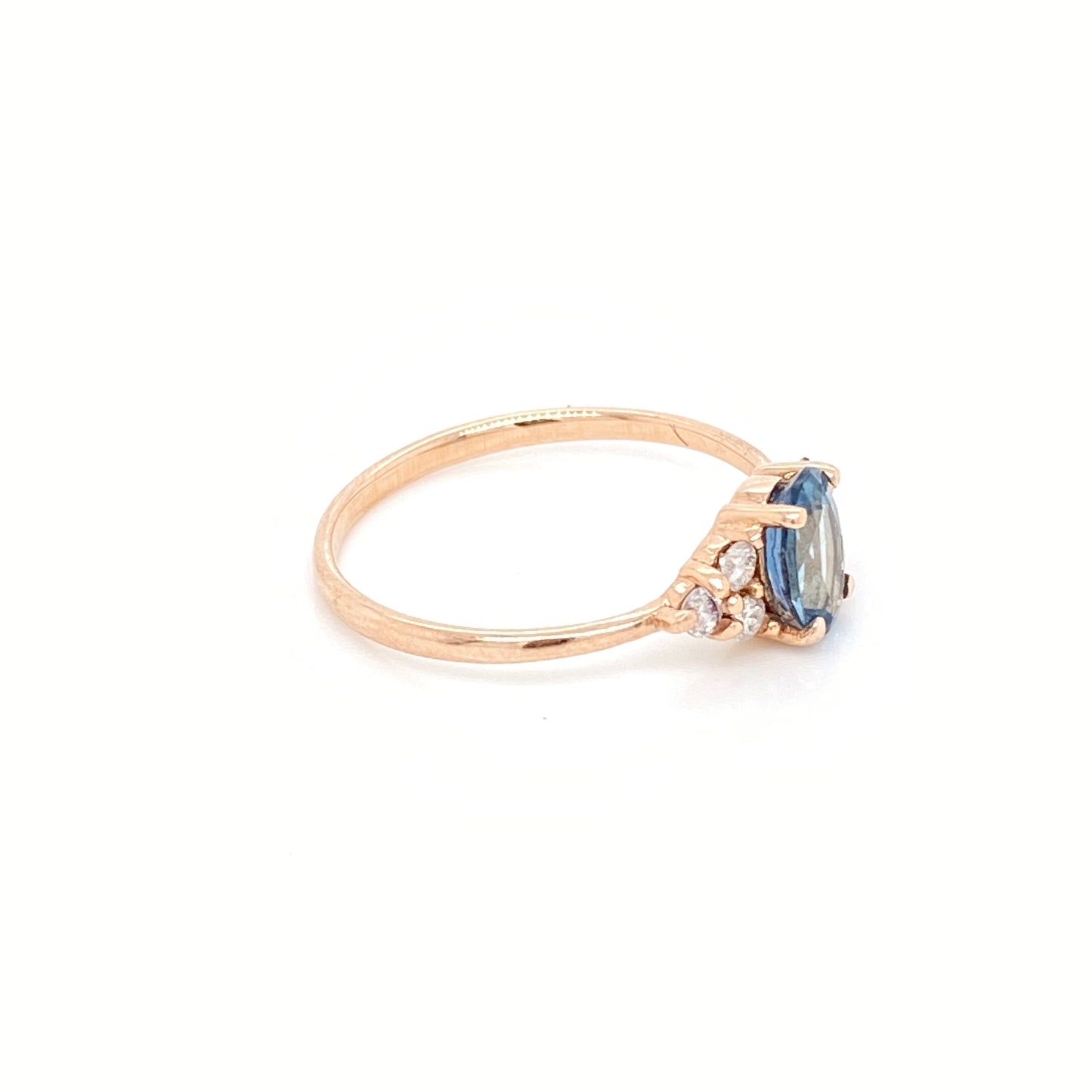 Intense blue Aquamarine ring with Rhodolite and Diamonds