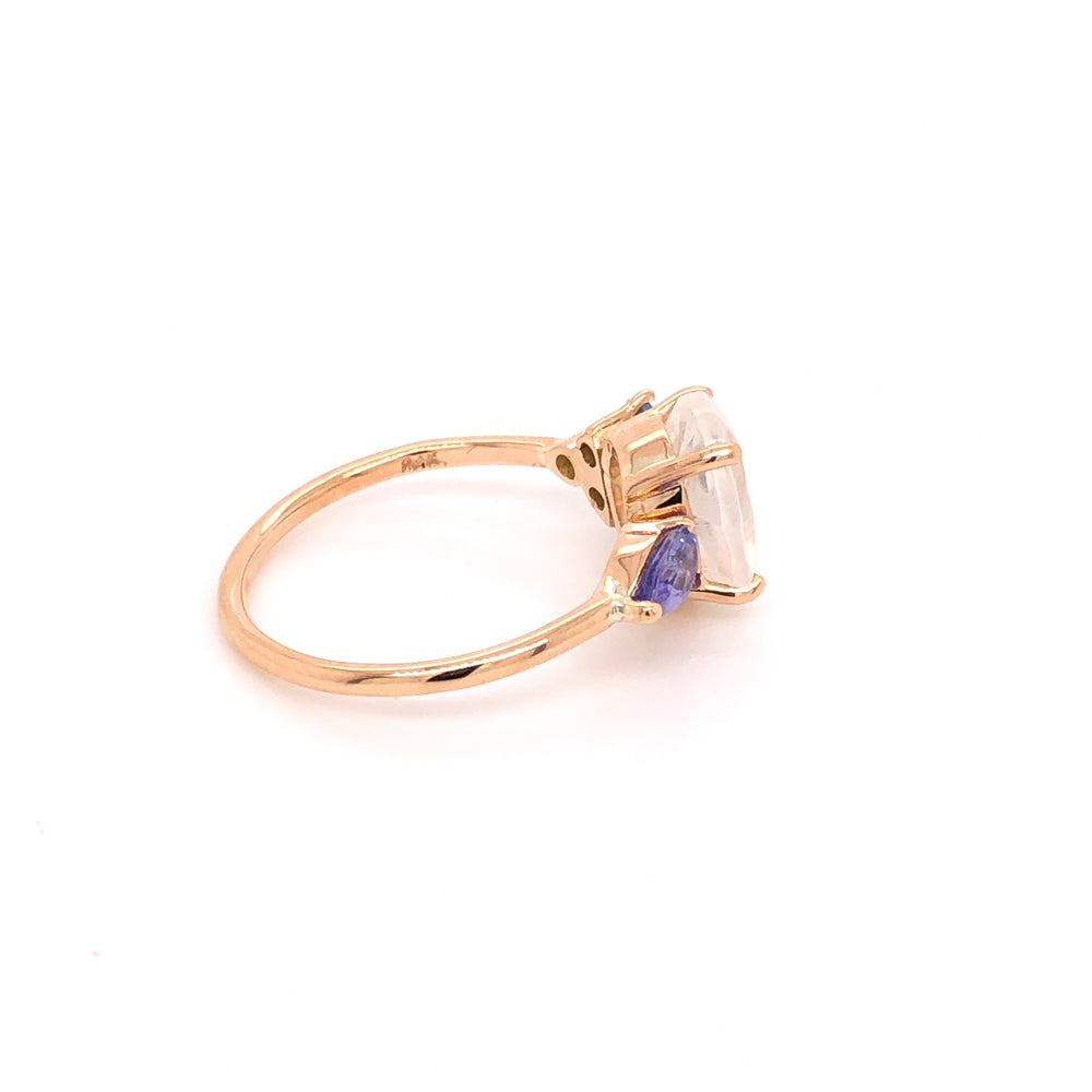 
                      
                        Anillo de Moonstone con Aguamarinas y Tanzanitas
                      
                    