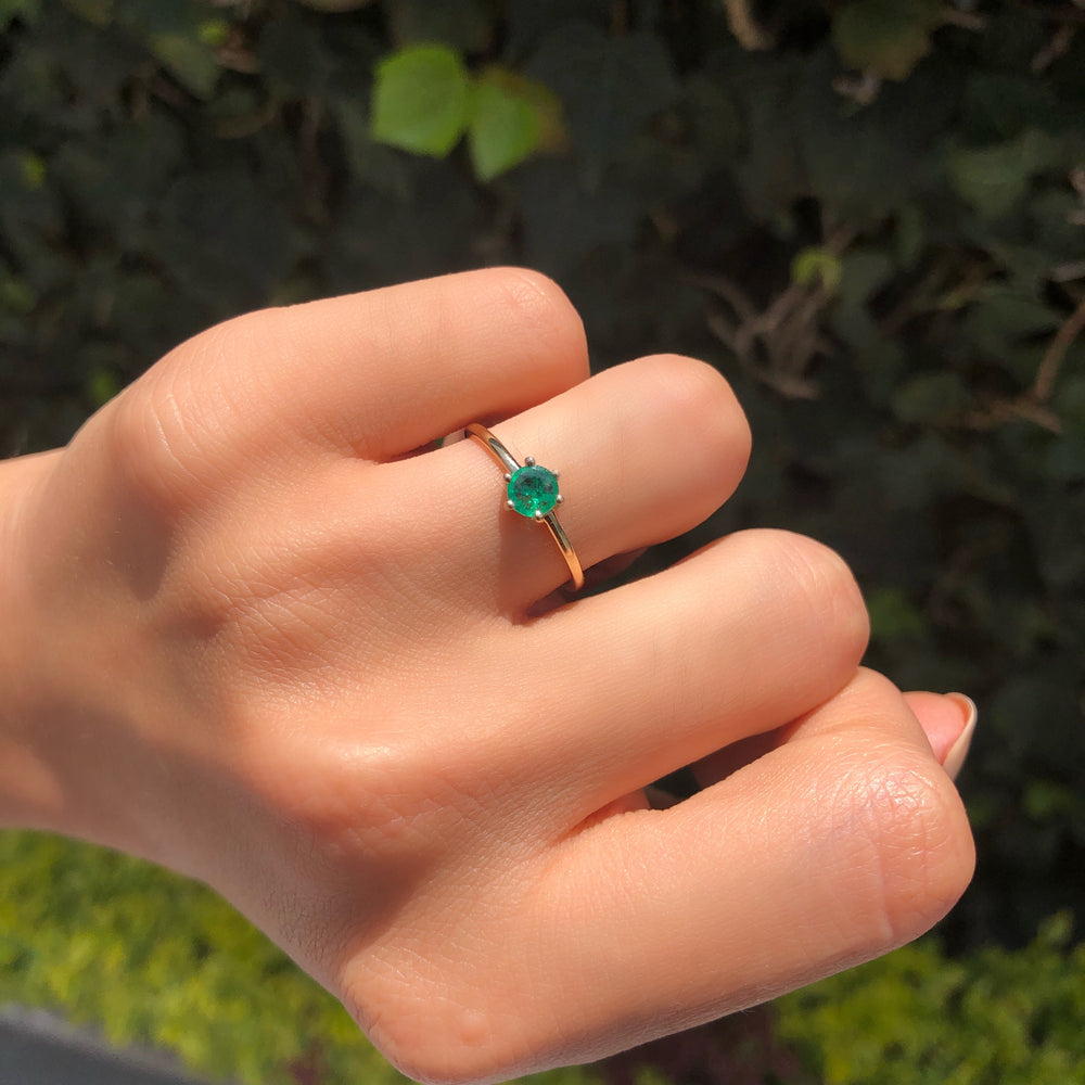 
                      
                        Solitaire Emerald Ring
                      
                    