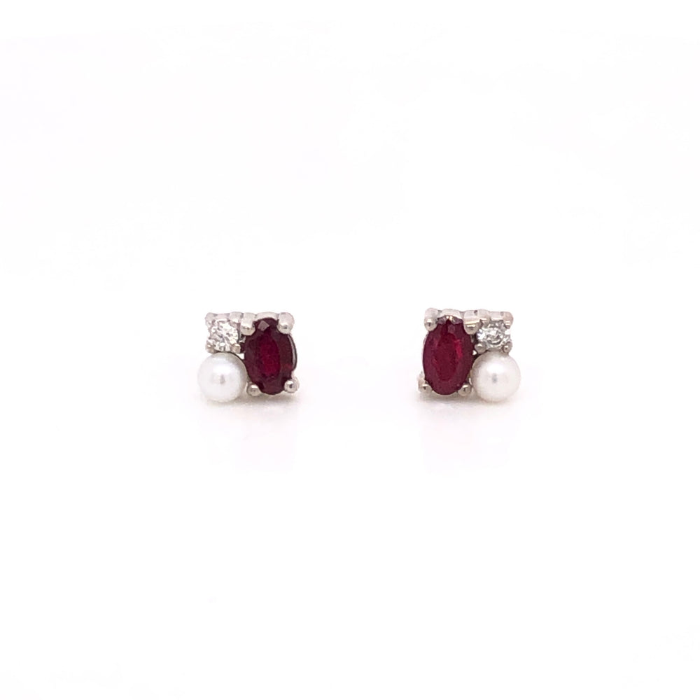 
                      
                        Erika Earrings with Sapphire or Ruby
                      
                    