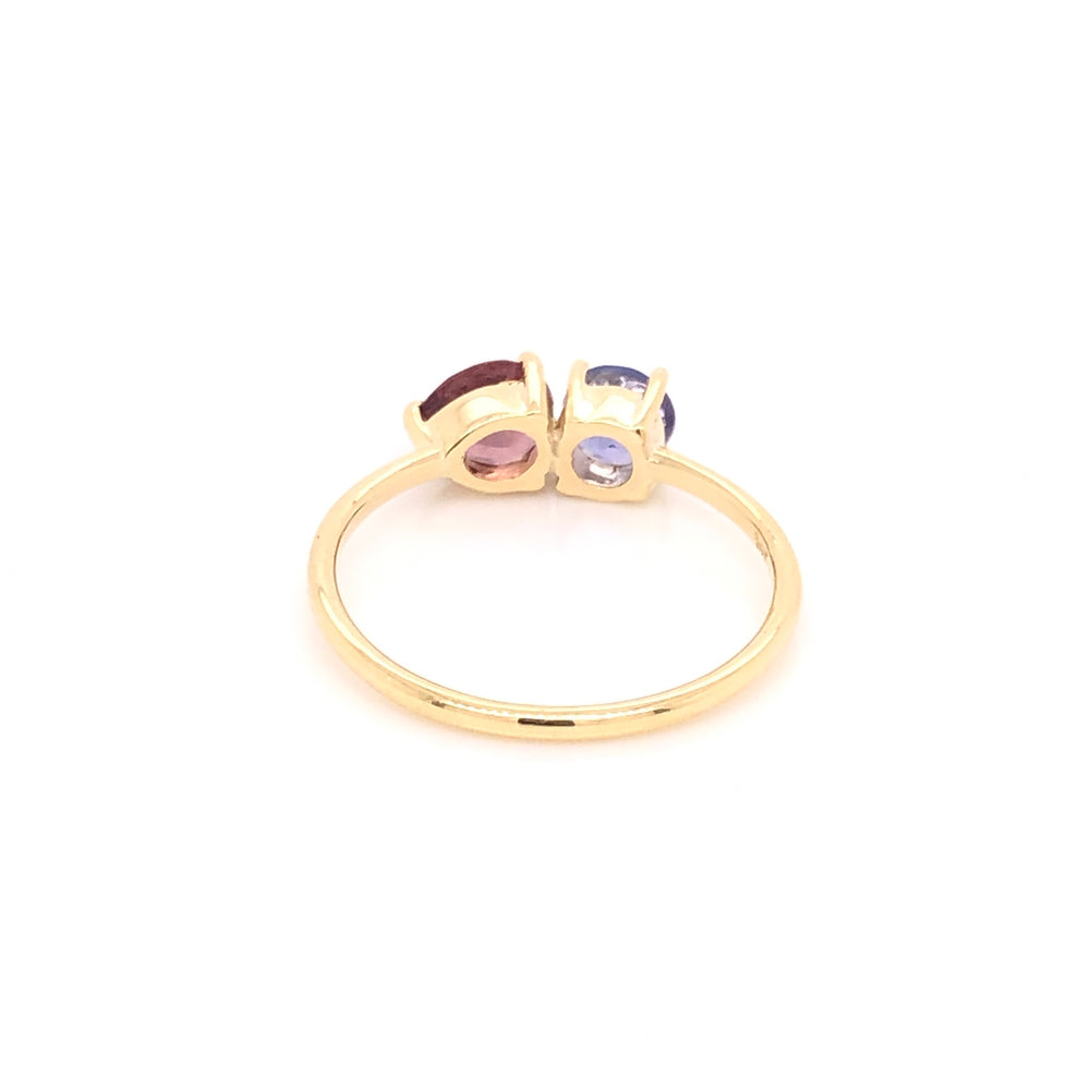 
                      
                        Anillo De Granate con Tanzanita
                      
                    