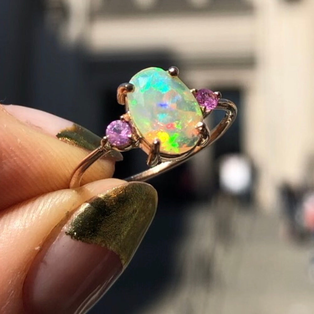 
                      
                        Opal Ring with Pink Sapphires
                      
                    