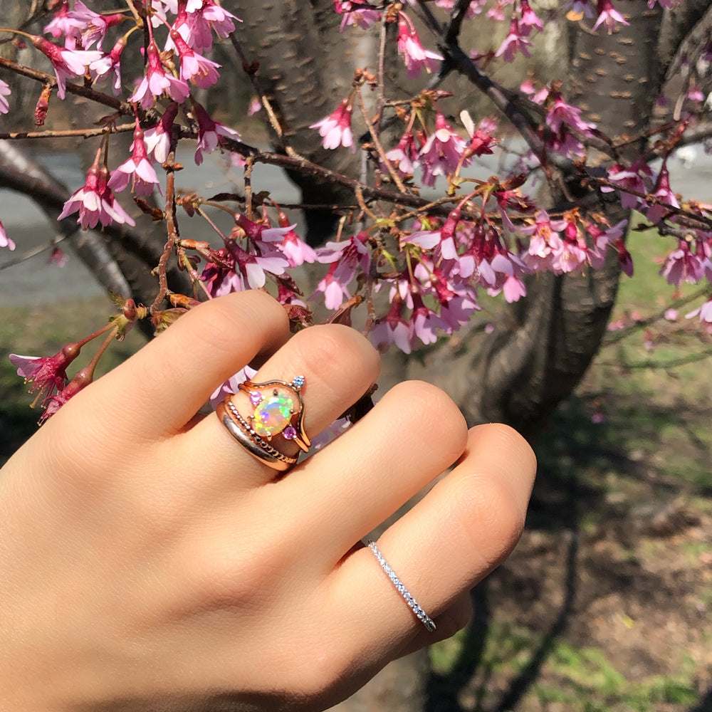 
                      
                        Opal Ring with Pink Sapphires
                      
                    